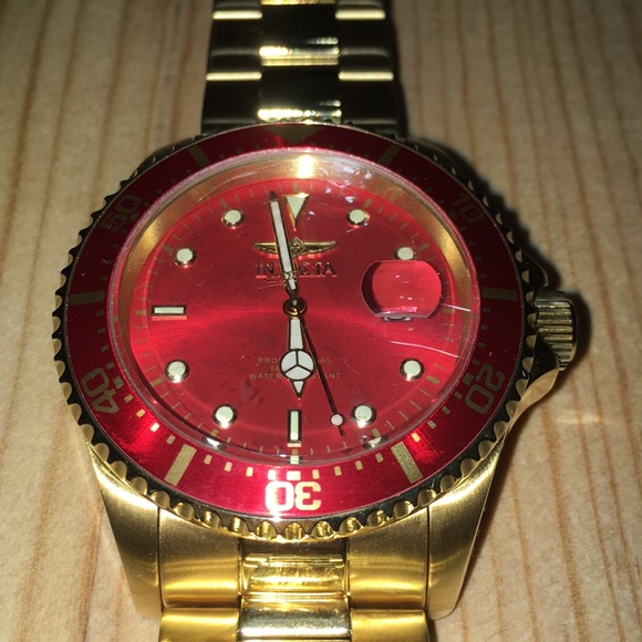 invicta red face watch